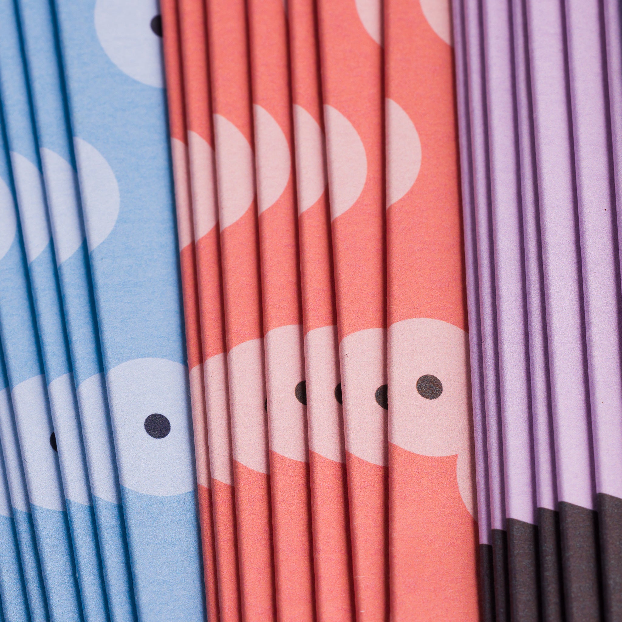 Detail of spines of a stack of PALP greeting cards