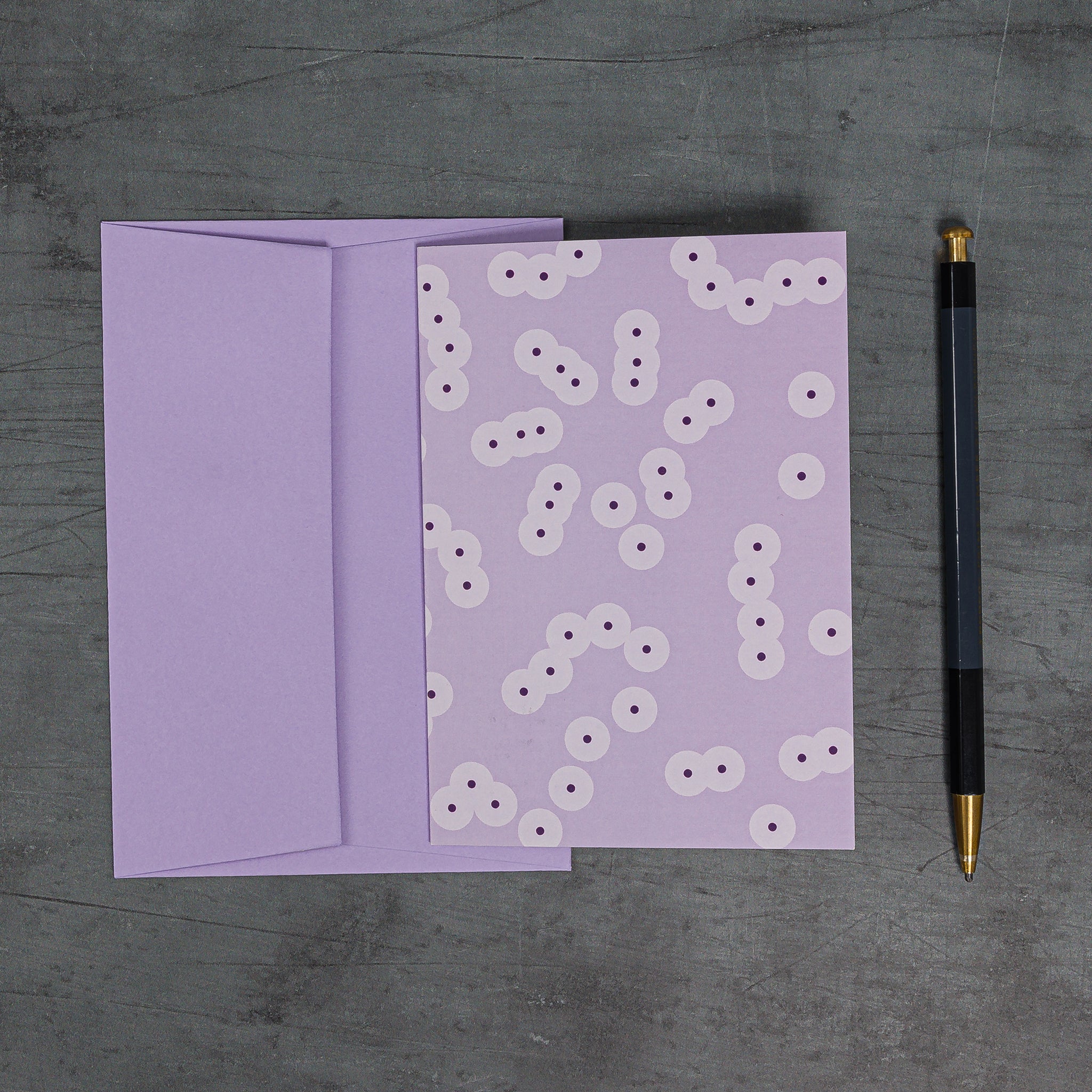 Spawn (lilac) greeting card with matching lilac envelope from G F Smith Colorplan range. Design resembles a schematised version of frog spawn