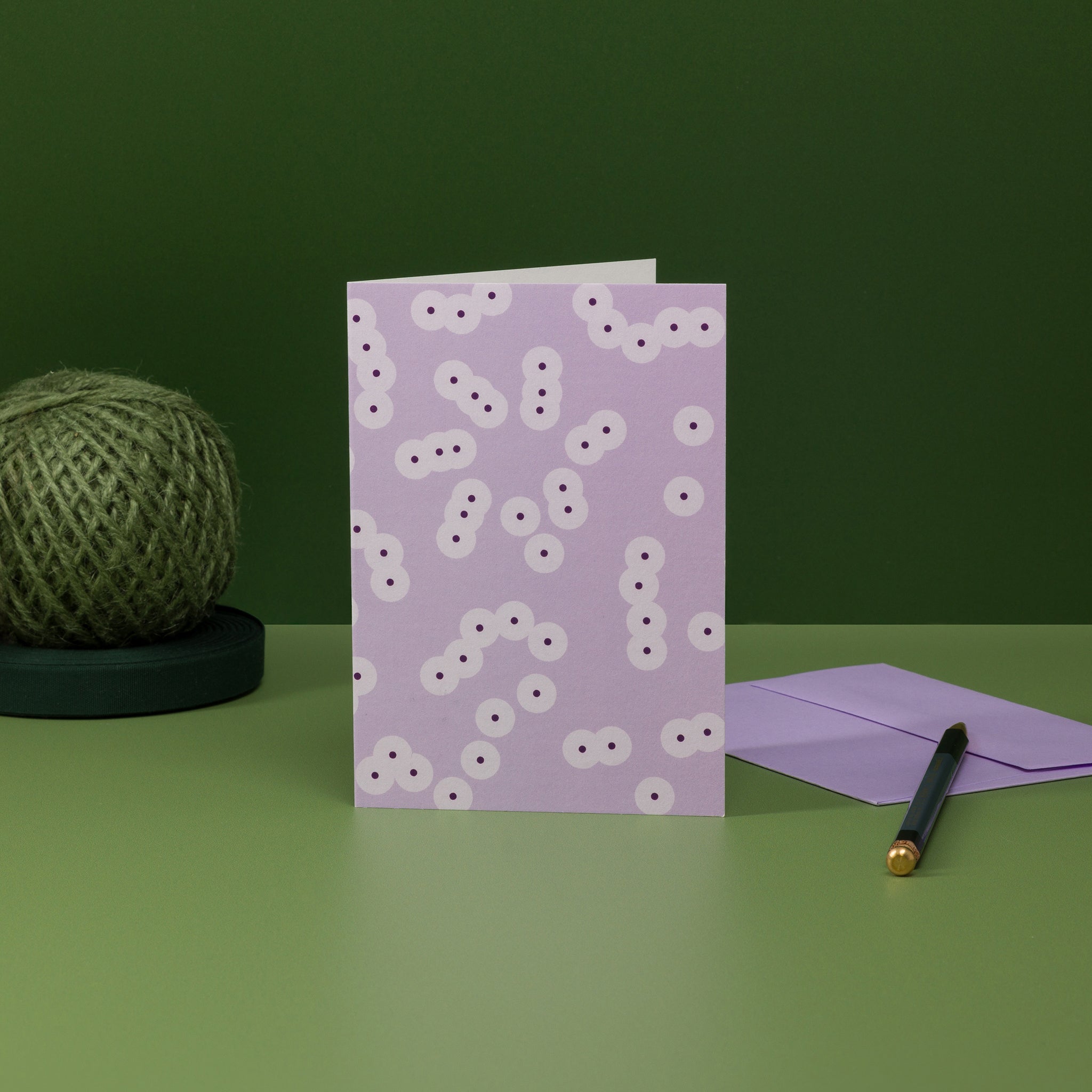 Spawn (lilac) greeting card, with matching lilac-coloured envelope. Geometric design of clustered circle motifs, inspired by frog spawn