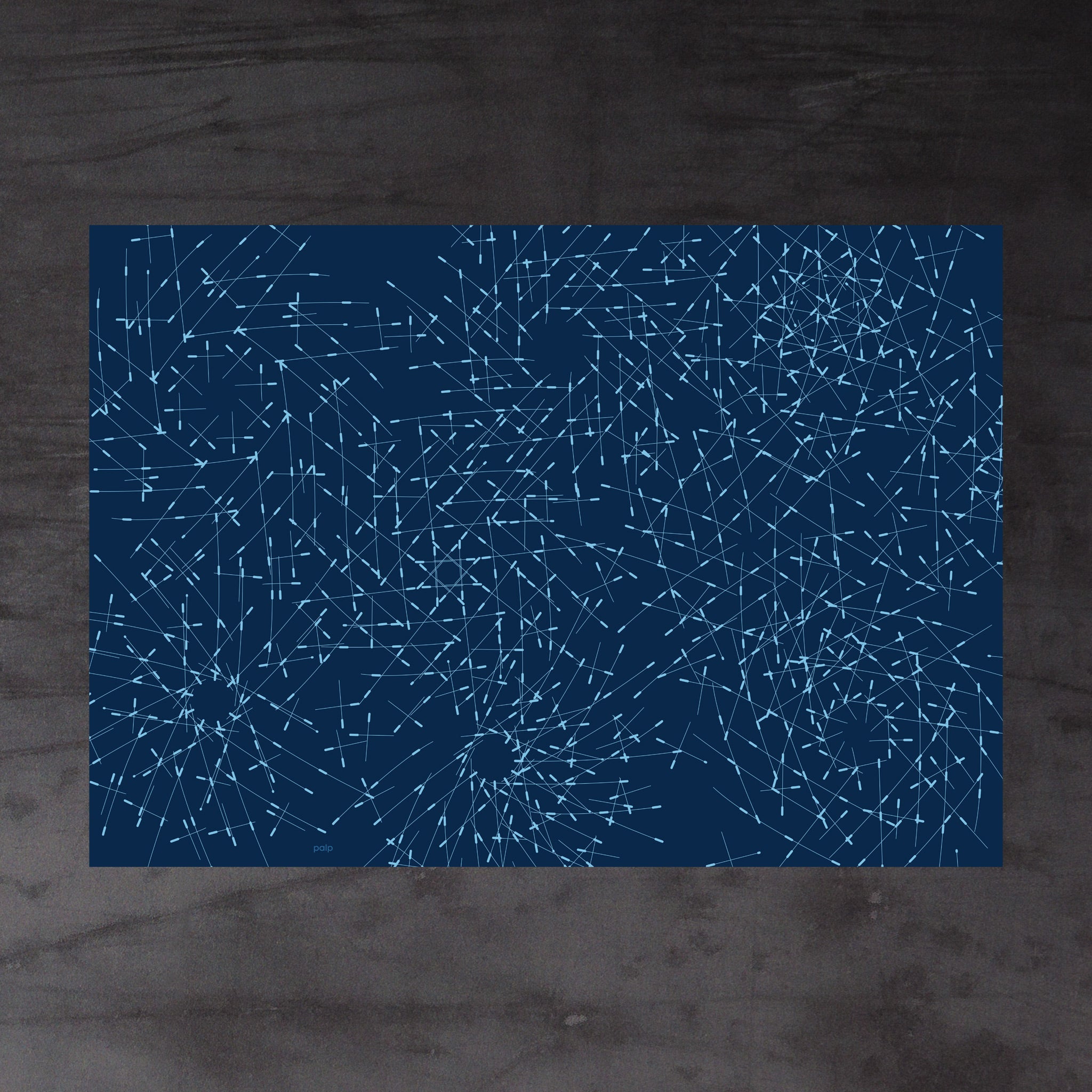 Aerial view of whole sheet of Briar wrapping paper. Dark blue background with pale blue lines. Irregular pattern of radiating, overlapping lines suggesting a dense thicket of thorny shrubs